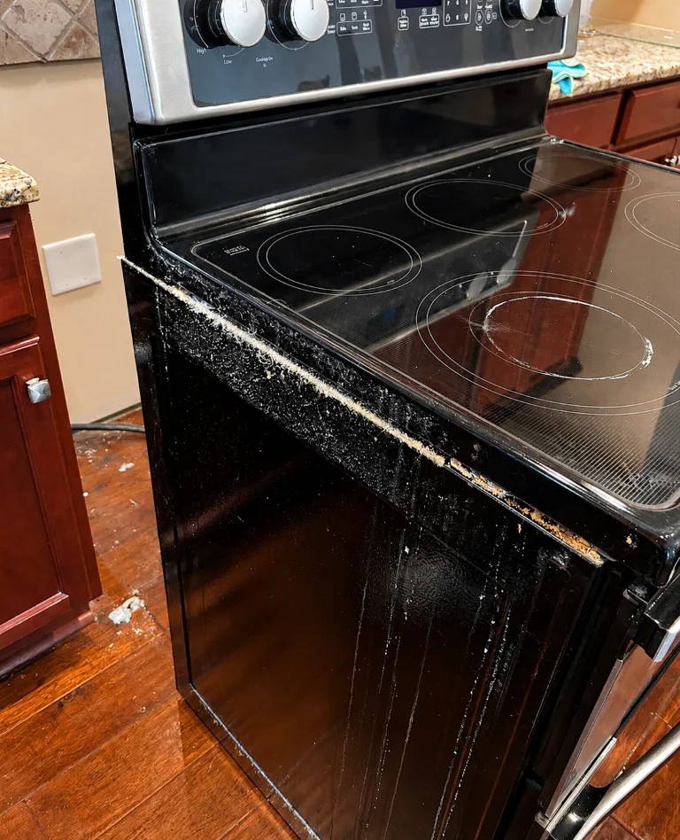 Before cleaning: grease and residue on range