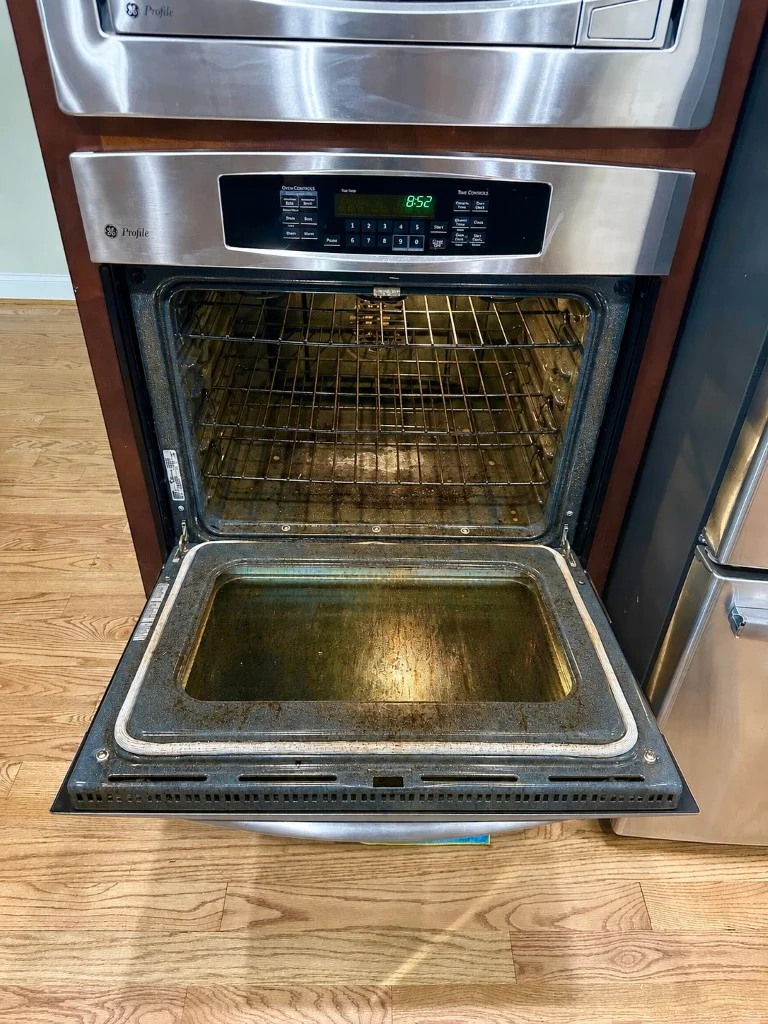 Before cleaning: oven grime and baked-on residue